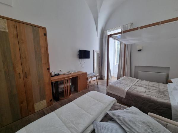 B&B Il Palazzotto Luxury Suites : photo 10 de la chambre chambre quadruple avec balcon 