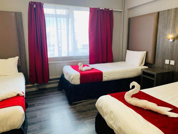 Hotel Lily : photo 4 de la chambre chambre triple