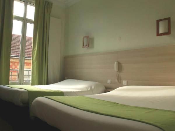 Hôtel De La Cathédrale : photo 8 de la chambre chambre quadruple