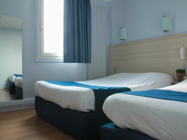 Hôtel De La Cathédrale : photo 3 de la chambre chambre quadruple