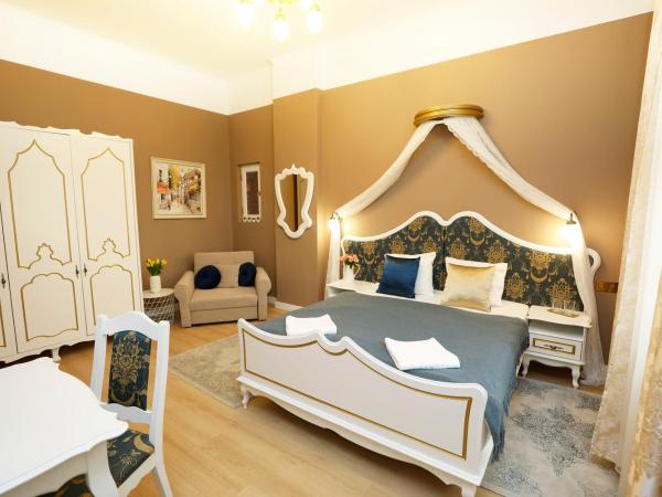 Villabaroque_Eger : photo 4 de la chambre chambre triple exécutive