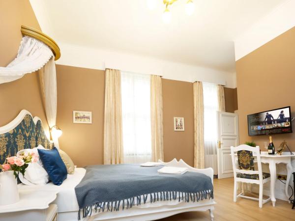 Villabaroque_Eger : photo 5 de la chambre chambre triple exécutive