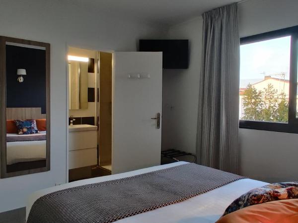 Logis Hôtel Les Bleuets : photo 8 de la chambre chambre double standard côté jardin