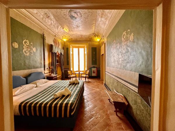 Casa Santangelo Suites : photo 1 de la chambre chambre double familiale