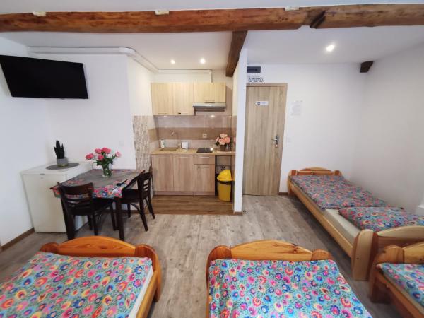 NOCLEGI POD STODOŁĄ : photo 1 de la chambre chambre quadruple premium