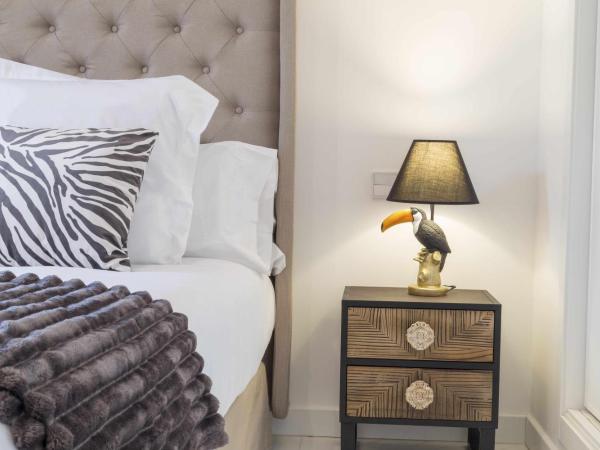 THE CLOCK HOUSE Luxury Urban Suites : photo 8 de la chambre suite deluxe