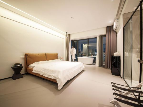 Sanya ChengHeLi Seaview Homestay : photo 7 de la chambre chambre double deluxe avec balcon - vue sur mer