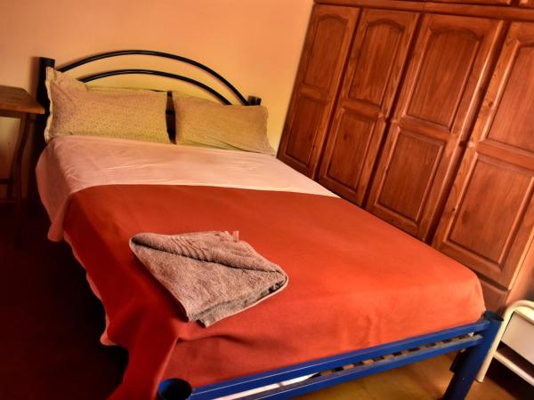 Hostel Joven casa Reggae : photo 2 de la chambre chambre lits jumeaux avec salle de bains commune