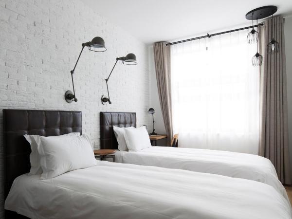 Yi Stack Hotel Beijing : photo 1 de la chambre chambre lits jumeaux standard