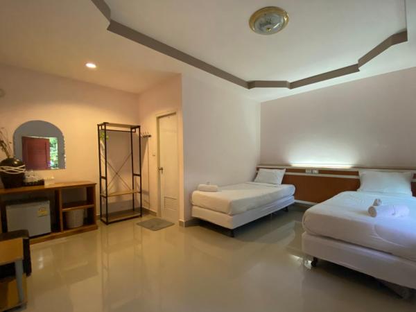 ชอว์ งาทอง รีสอร์ต Chor Ngar Thong Erawan : photo 4 de la chambre chambre lits jumeaux spacieuse