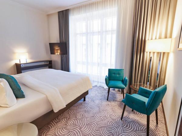 Steigenberger Hotel Herrenhof : photo 1 de la chambre chambre lit king-size ou lits jumeaux supérieure