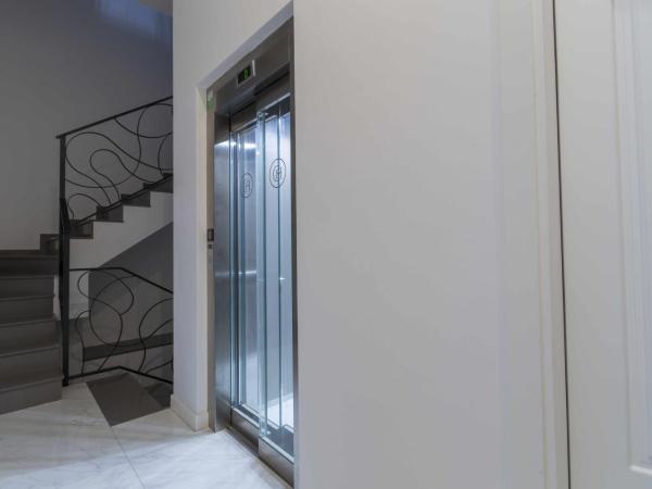 THE CLOCK HOUSE Luxury Urban Suites : photo 3 de la chambre suite en duplex