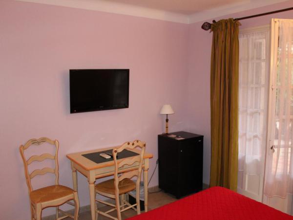 Hôtel Les Palmiers : photo 3 de la chambre chambre lits jumeaux confort