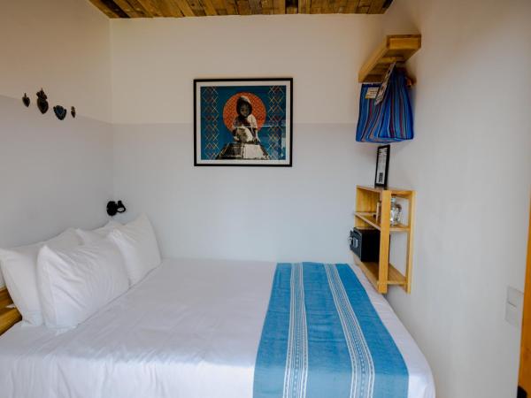 Hotel con Corazón : photo 3 de la chambre petite chambre double