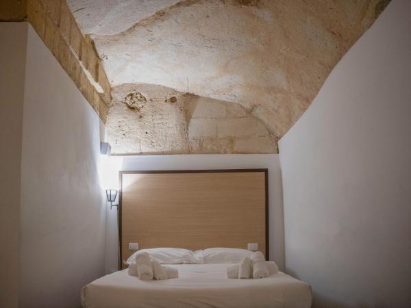 Residence Le Vie Del Mosto : photo 2 de la chambre chambre quadruple supérieure