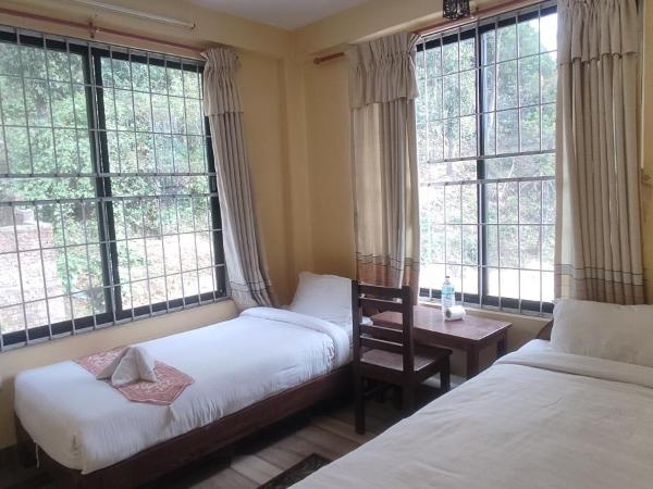 Jungle Front Lodge : photo 2 de la chambre chambre lits jumeaux