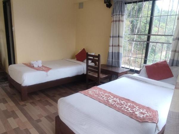 Jungle Front Lodge : photo 3 de la chambre chambre lits jumeaux