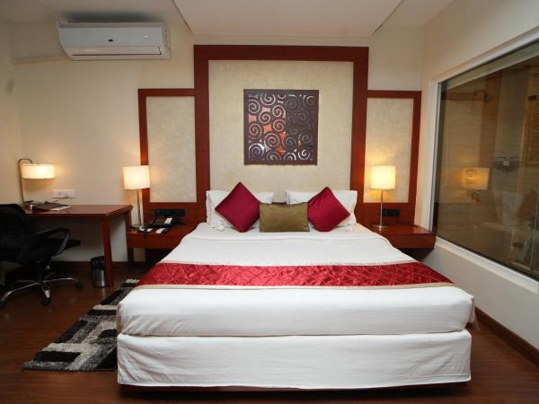 The Altruist Business Hotel Hitech : photo 2 de la chambre suite lit king-size