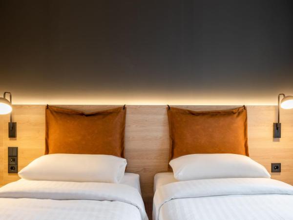 Moxy Dortmund City : photo 2 de la chambre chambre lits jumeaux moxy