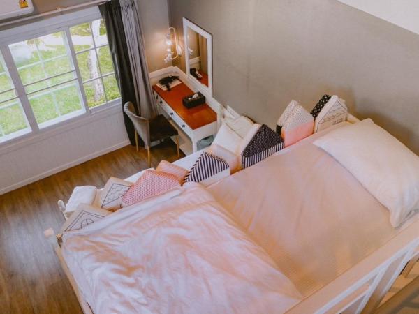 Baan JaoKorKluay บ้านเจ้ากอกล้วย : photo 2 de la chambre chambre familiale