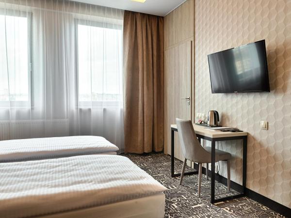 Citi Hotel's Łódź : photo 3 de la chambre chambre lits jumeaux standard