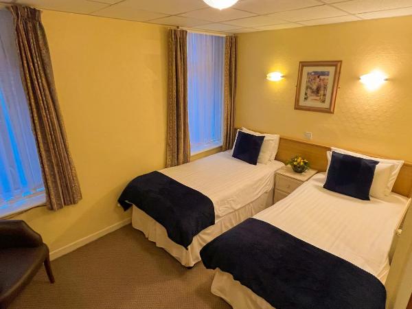 Sutcliffe Hotel : photo 3 de la chambre chambre lits jumeaux