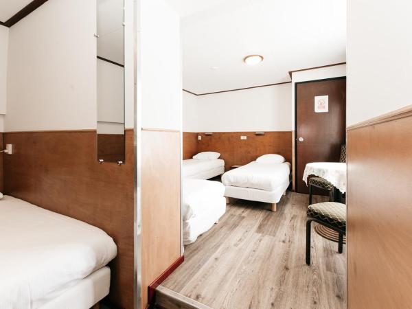 Hotel van Gelder : photo 2 de la chambre chambre quadruple avec salle de bains privative