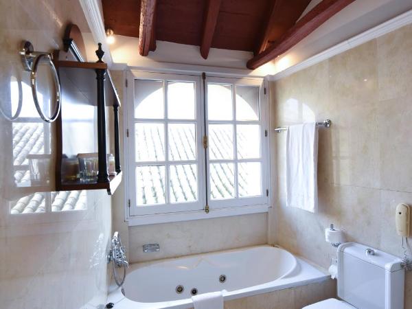 Hotel Las Casas de la Judería : photo 9 de la chambre chambre double avec baignoire spa