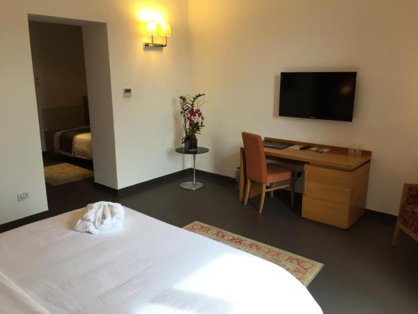 Grande Albergo Alfeo : photo 4 de la chambre chambre triple