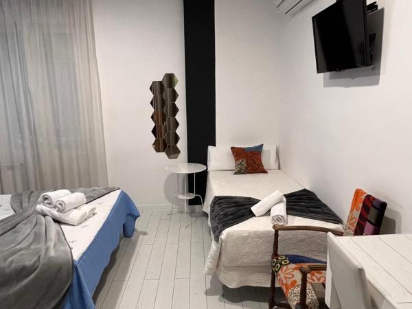 Hostal Madrid Star : photo 4 de la chambre chambre triple classique