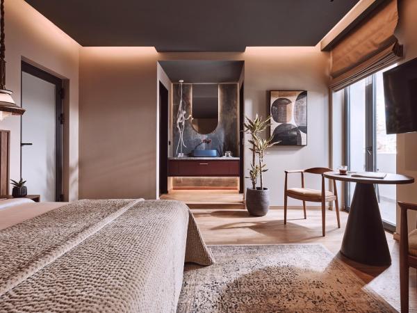 Cama Luxury Suites : photo 6 de la chambre chambre double deluxe - vue latérale sur mer