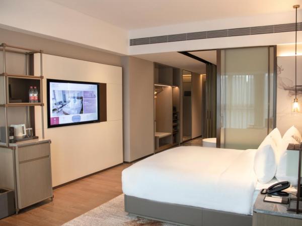 LN Dongfang Hotel Pazhou-Free Shuttle Buses and Registration Counter for Purchasing Agents during the Canton Fair : photo 5 de la chambre chambre lit king-size exécutive