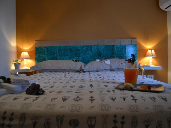 Un Tetto Di Stelle Deluxe Home : photo 2 de la chambre chambre double avec terrasse