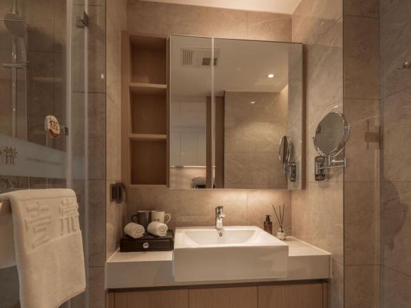 Chongqing Yitang Hotel Apartment : photo 4 de la chambre studio lit king-size premier