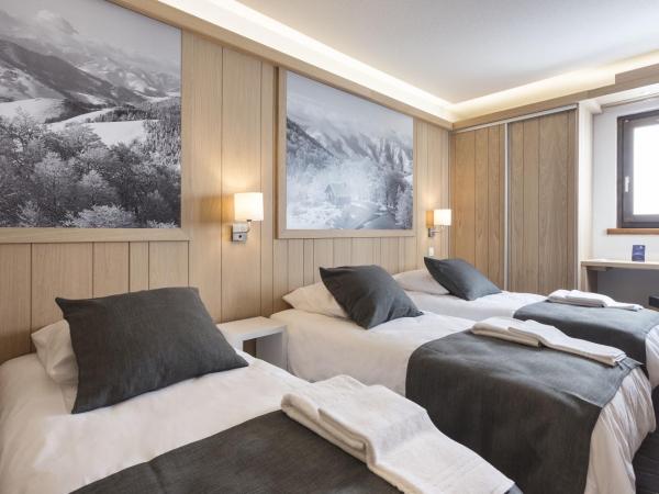 Hôtel Club mmv Les Arolles **** : photo 3 de la chambre chambre triple