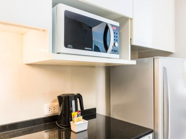 Hôtel Maitria Sukhumvit 18 Bangkok - Une Collection Chatrium : photo 4 de la chambre studio supérieur avec lits jumeaux