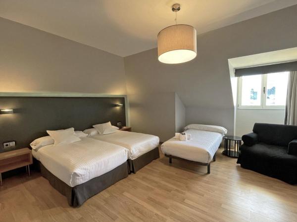 Hotel Chiqui : photo 3 de la chambre chambre lits jumeaux avec lit d’appoint - 301