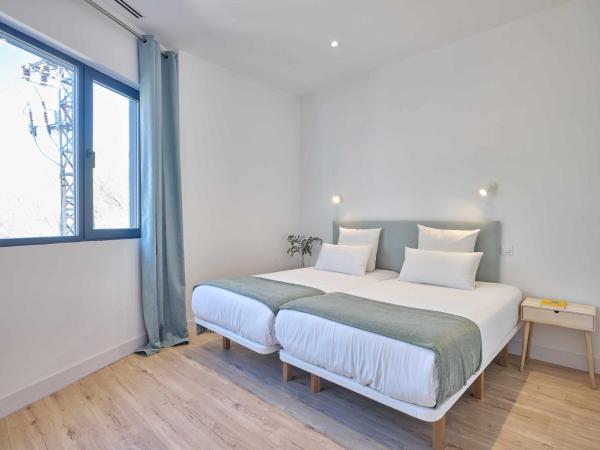 Paseo Suites Hotel : photo 2 de la chambre suite lit queen-size deluxe