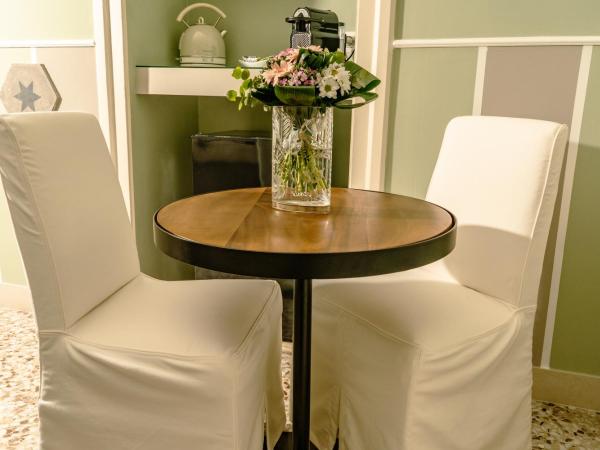 MammaDada charm rooms : photo 6 de la chambre chambre quadruple supérieure