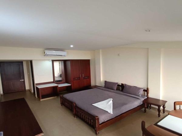 Baywatch Beach Homes : photo 4 de la chambre chambre double deluxe - vue latérale sur mer