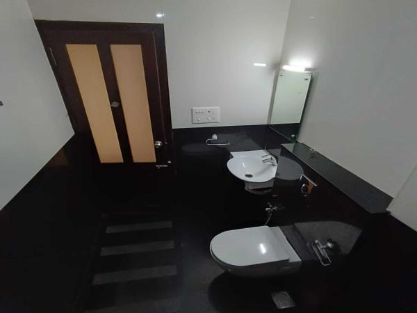 Baywatch Beach Homes : photo 9 de la chambre chambre double deluxe - vue latérale sur mer