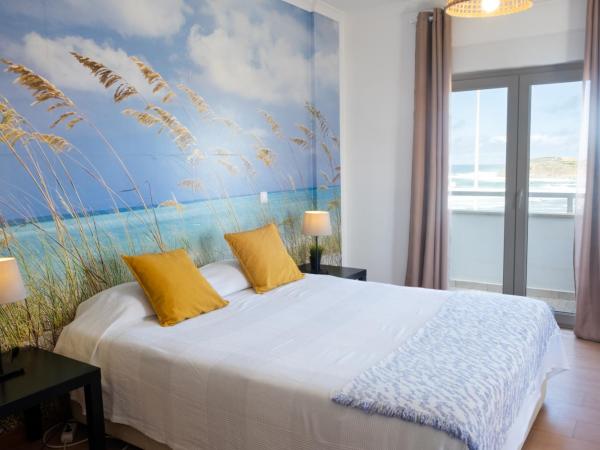 PKSC Surf House : photo 5 de la chambre chambre double deluxe avec balcon - vue sur mer