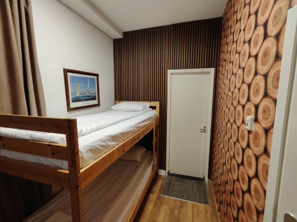 Hotel Holland Lodge : photo 4 de la chambre chambre lits jumeaux - vue sur jardin