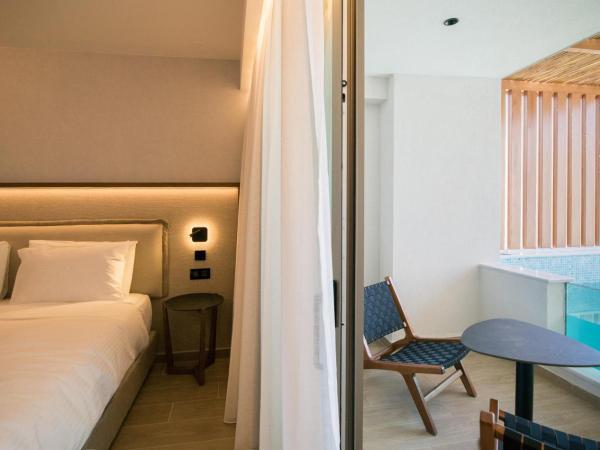 AKASHA Beach Hotel & Spa : photo 3 de la chambre hébergement urbain chic avec petite piscine