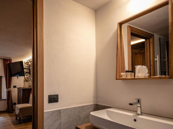 Les Plaisirs d'Antan : photo 4 de la chambre suite exécutive