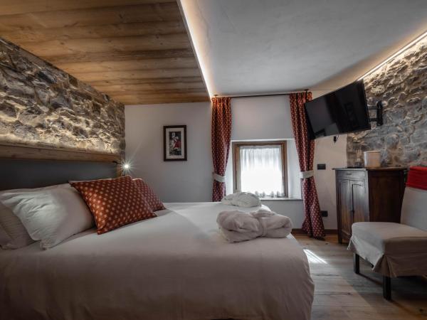 Les Plaisirs d'Antan : photo 5 de la chambre suite exécutive