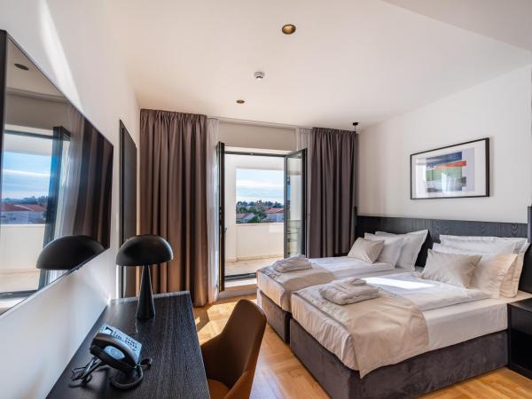 Miramare Hotel : photo 1 de la chambre chambre lits jumeaux avec balcon