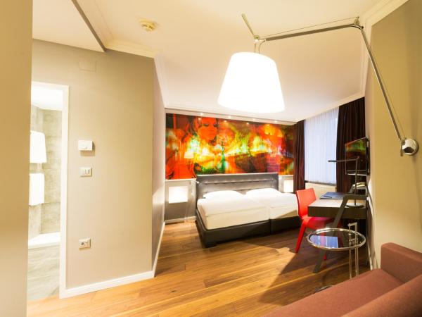 Der Wilhelmshof : photo 2 de la chambre chambre quadruple de luxe avec vue sur le jardin