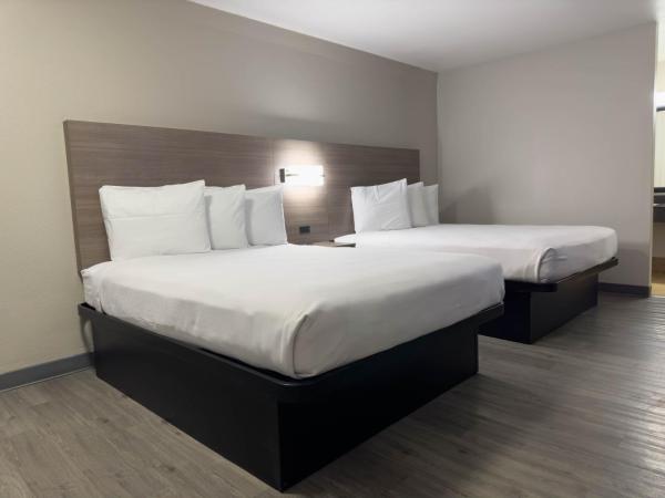 Americas Best Value Inn Austin : photo 1 de la chambre chambre 2 lits queen-size - non-fumeurs