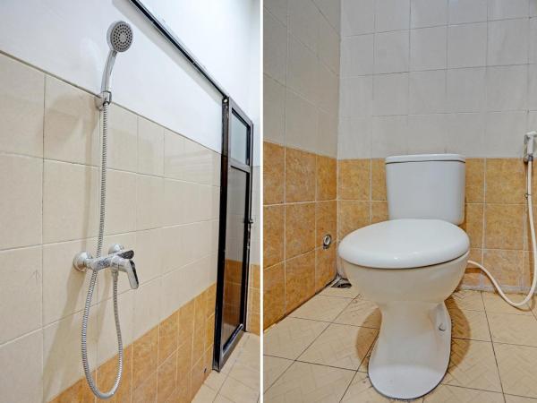 OYO 92435 Sunlo Cozy Home Family Homestay Syariah : photo 7 de la chambre chambre lits jumeaux Économique